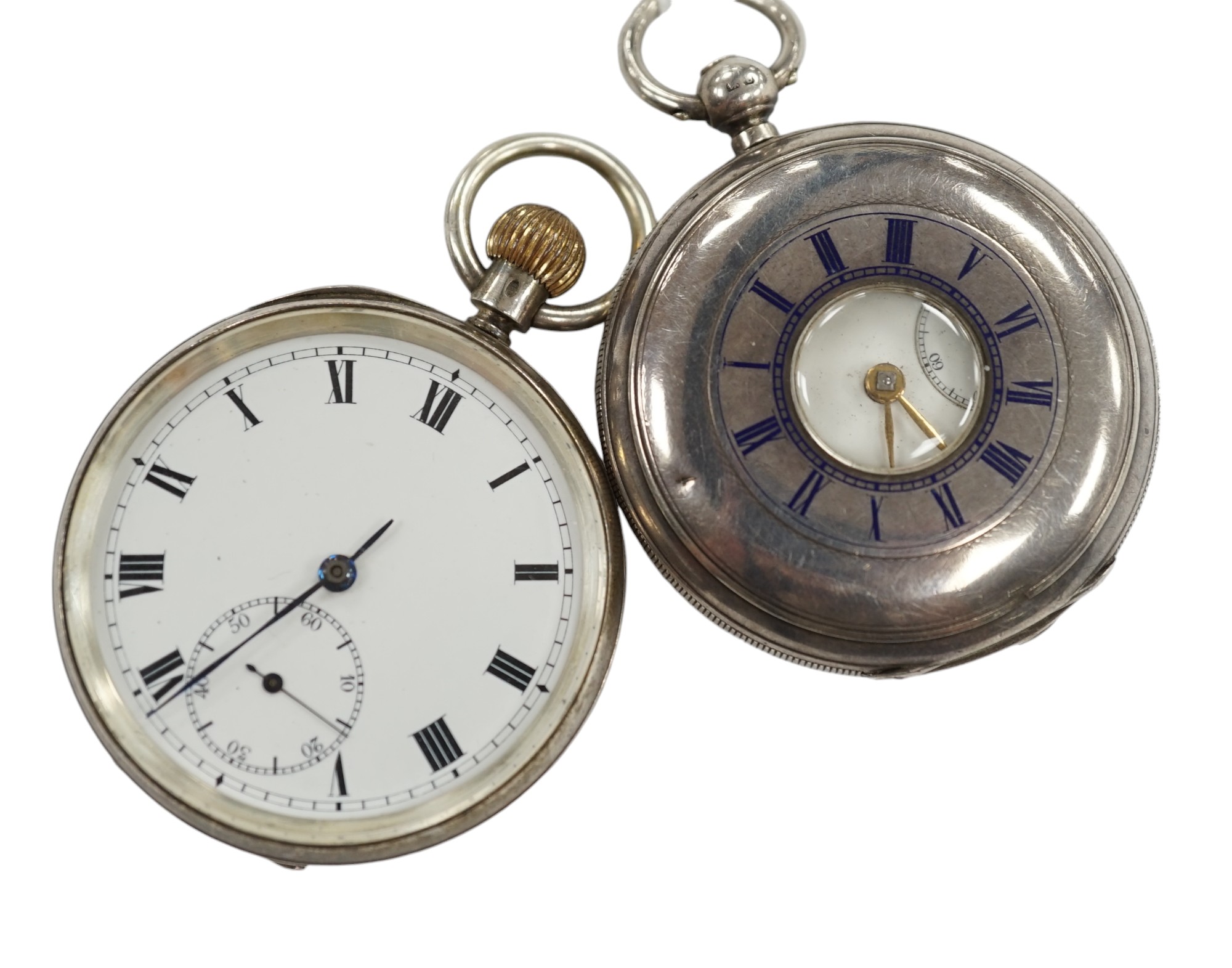 A late Victorian silver half hunter pocket watch and a later silver open faced pocket watch. Condition - poor to fair